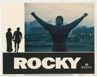 9y789 ROCKY LC #1 1977 boxer Sylvester Stallone with arms raised at top of art museum steps!