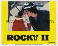 9y790 ROCKY II LC #8 1979 close up of Sylvester Stallone & Talia Shire in the snow, boxing!