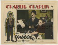 9y860 SUNNYSIDE LC R1927 Charlie Chaplin sings as Edna Purviance plays piano, but not well enough!