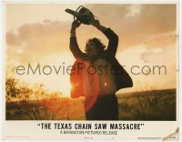 9y882 TEXAS CHAINSAW MASSACRE LC #3 1974 iconic horror image of Leatherface holding chainsaw!