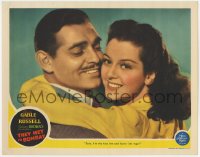 9y891 THEY MET IN BOMBAY LC 1941 Rosalind Russell & Clark Gable, the kiss 'em & leave 'em type!