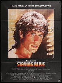 9f934 STAYING ALIVE French 1p 1983 super close up of John Travolta in Saturday Night Fever sequel!