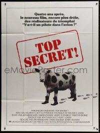 9f959 TOP SECRET French 1p 1984 Zucker Bros. James Bond spy spoof, wacky image of cow with boots!