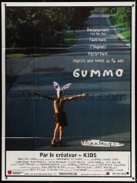 2k637 GUMMO French 1p 1997 wacky image of half-naked man on skateboard & wearing bunny hat!