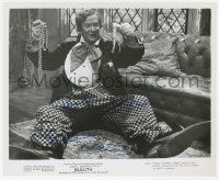 3f0682 MICHAEL CAINE signed 8x10 still 1972 admiring lots of jewelry during fake robbery in Sleuth!