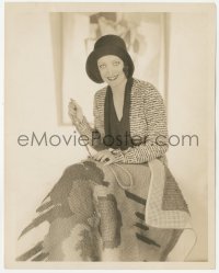 4w1352 JOAN CRAWFORD 8x10.25 still 1932 smiling seated portrait in flapper hat & doing cross stitch!