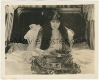 4w1427 LURE OF AMBITION 8.25x10 still 1919 great porrait of Theda Bara in bed with a snack!