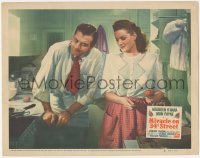 4w0670 MIRACLE ON 34th STREET LC #6 1947 Maureen O'Hara is amused by John Payne in the kitchen!