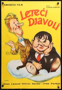 5j1079 FLYING DEUCES Yugoslavian 19x27 1960s great artwork of Stan Laurel & Oliver Hardy on cloud!