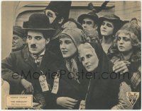 5s0227 IMMIGRANT LC R1932 great close up of worried Charlie Chaplin with other immigrants!