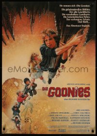 6h0207 GOONIES German 1985 cool Drew Struzan art of top cast hanging from stalactite!