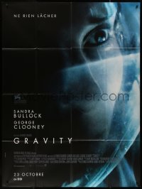 7y0950 GRAVITY advance French 1p 2013 super close up of astronaut Sandra Bullock in space suit!