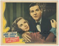 9t0379 IT STARTED WITH EVE LC 1941 surprised Robert Cummings in tuxedo holding Deanna Durbin!