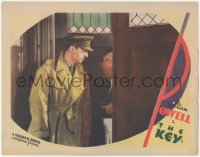 9t0384 KEY LC 1934 British officer William Powell held at gunpoint by man at door, Michael Curtiz!