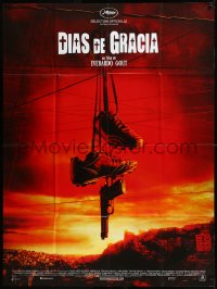 9y1843 DIAS DE GRACIA French 1p 2011 great image of shoes & gun hanging from power lines!