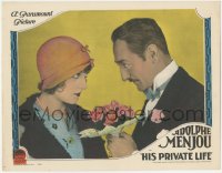 9y0740 HIS PRIVATE LIFE LC 1928 close up of Adolphe Menjou giving flowers to pretty Kathryn Carver!