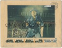 9y0804 RIO BRAVO LC #4 1959 close up of Dean Martin in shootout on the street, Howard Hawks!