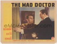 1a0838 MAD DOCTOR LC 1940 crazy murderer Basil Rathbone stops Martin Kosleck from entering the room!