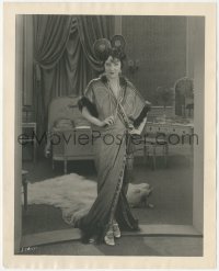 1b2276 GLORIA SWANSON 8x10 still 1921 in elaborate robe by bearskin rug, The Great Moment, lost film