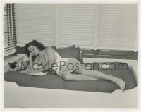 1b2302 JANE RUSSELL deluxe 8x9.75 still 1942 relaxing on bed, reading a book beside her Siamese cat!