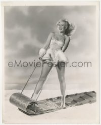 1b2304 JANIS CARTER 8.25x10 still 1945 wonderful portrait in skimpy winter outfit on sled by Scott!