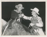 1b2310 JOHN WAYNE/GENE AUTRY 8x10.25 still 1949 fixing cuffs before Rodeo Grand Entry Parade!