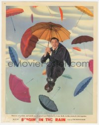 1b2182 SINGIN' IN THE RAIN photolobby 1952 great image of Gene Kelly in a shower of umbrellas!