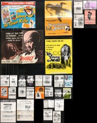 1d0536 LOT OF 30 UNCUT PRESSBOOKS 1950s-1970s advertising for a variety of different movies!