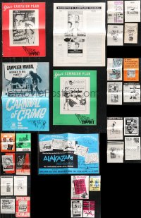 1d0537 LOT OF 29 UNCUT PRESSBOOKS 1950s-1970s advertising for a variety of different movies!