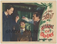 1f0555 ARSENIC & OLD LACE LC 1944 Peter Lorre & Raymond Massey toast over bound & gagged Cary Grant!