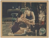 1f0674 PAGAN LADY LC 1931 close up of Evelyn Brent & Conrad Nagel in bathing suits by fireplace!