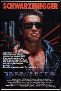 1f1200 TERMINATOR 1sh 1984 close up of classic cyborg Arnold Schwarzenegger with gun, border style!