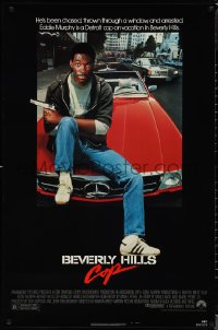 1r0959 BEVERLY HILLS COP 1sh 1984 great image of detective Eddie Murphy sitting on red Mercedes!