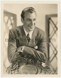 1t2221 GARY COOPER 8x10.25 still 1940s wonderful Paramount studio portrait leaning on ornate chair!