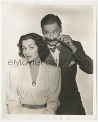 2b1748 FOOTSTEPS IN THE DARK candid 8x10 still 1941 Flynn uses Marshall's hair as mustache by Welbourne!