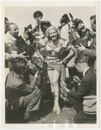 2b1824 MARIE MCDONALD 6.75x8.5 news photo 1942 surrounded by photographers as she lifts her skirt!