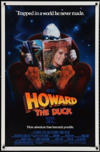 2c1065 HOWARD THE DUCK 1sh 1986 George Lucas, art of him reading magazine w/Lea Thompson on it!