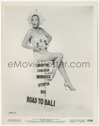 2f2003 ROAD TO BALI candid 8x10.25 still 1952 sexy Dorothy Lamour sitting on sign with movie names!