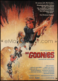 2p0491 GOONIES German 2p 1985 cool Drew Struzan art of top cast hanging from stalactite!