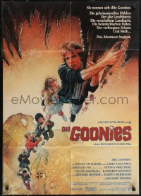 2p0581 GOONIES German 1985 cool Drew Struzan art of top cast hanging from stalactite!