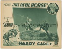 2p1242 DEVIL HORSE chapter 9 LC 1932 Harry Carey points gun at bad guy carrying girl, The Showdown!