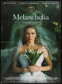 2t0226 MELANCHOLIA French 1p 2011 Lars von Trier directed, c/u of bride Kirsten Dunst in water!