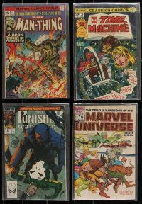 2x0338 LOT OF 4 MARVEL COMIC BOOKS 1970s-1980s Man-Thing, Time Machine, Punisher, Marvel Universe!