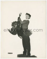 3b0816 AUDREY HEPBURN English 8x10 still 1950 she's lifting a Thanksgiving turkey half her size!