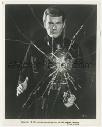 3b0972 LIVE & LET DIE 8x10.25 still 1973 Roger Moore as James Bond behind glass with bullet hole!