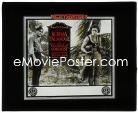 3b0789 ISLE OF CONQUEST glass slide 1919 Norma Talmadge & Wyndham Standing shipwrecked on island!