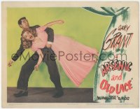 3b0453 ARSENIC & OLD LACE LC 1944 c/u of scared Cary Grant carrying Priscilla Lane, Frank Capra