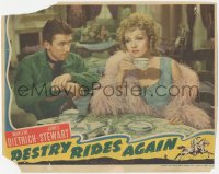 3b0470 DESTRY RIDES AGAIN LC 1939 c/u of new sheriff James Stewart staring at sexy Marlene Dietrich!