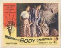 3d0805 INVASION OF THE BODY SNATCHERS LC 1956 scared Kevin McCarthy & Dana Wynter outside cave!