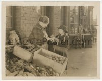 3p2111 RAG MAN 8x10.25 still 1925 Jackie Coogan buying an apple from fruit vendor on street!